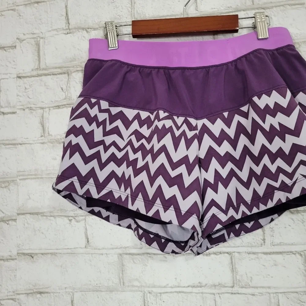 NIKE purple zig-zag athletic shorts